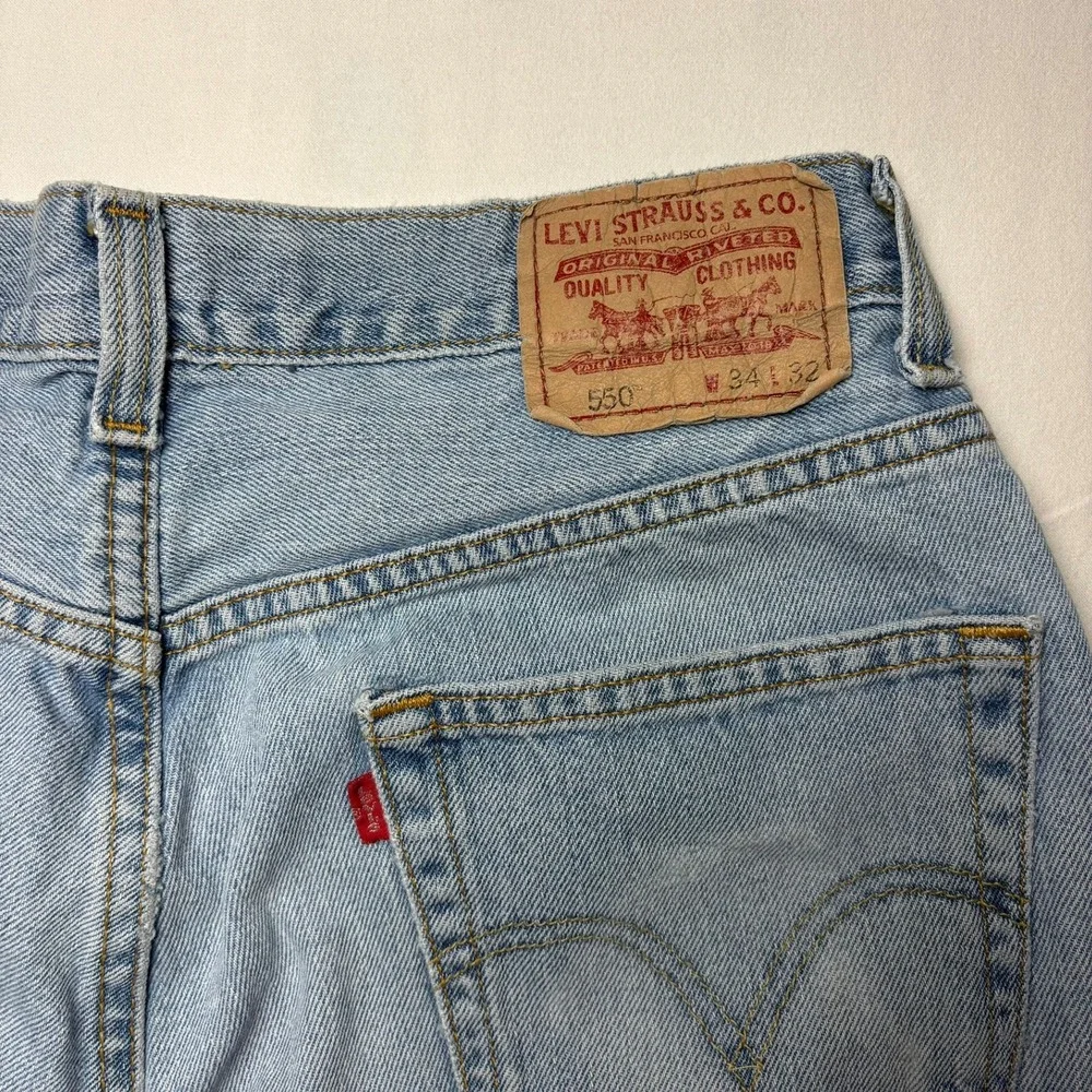 VTG Levi's 550 Jeans Mens 34x32 Fits 33x31 Light Blue Relaxed Fit Denim Fade